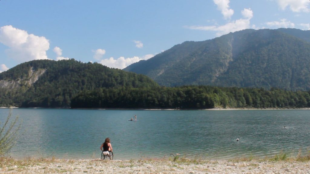 Film Stills of Pierre H. Brinker swimming in a lake during his roadtrip through Europe, Sylvensteinsee, Bavaria, Germany, 2024