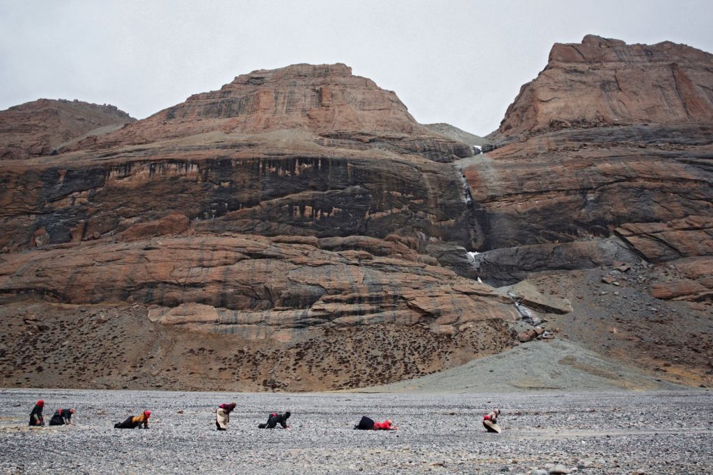 A family pilgrimage around Mount Kailash. Mount Kailash is considered the center of the world by Hindus, Jains, Buddhists, and Bönpo. The circumambulation of Mount Kailash is one of the most important pilgrimages for these believers, 2018